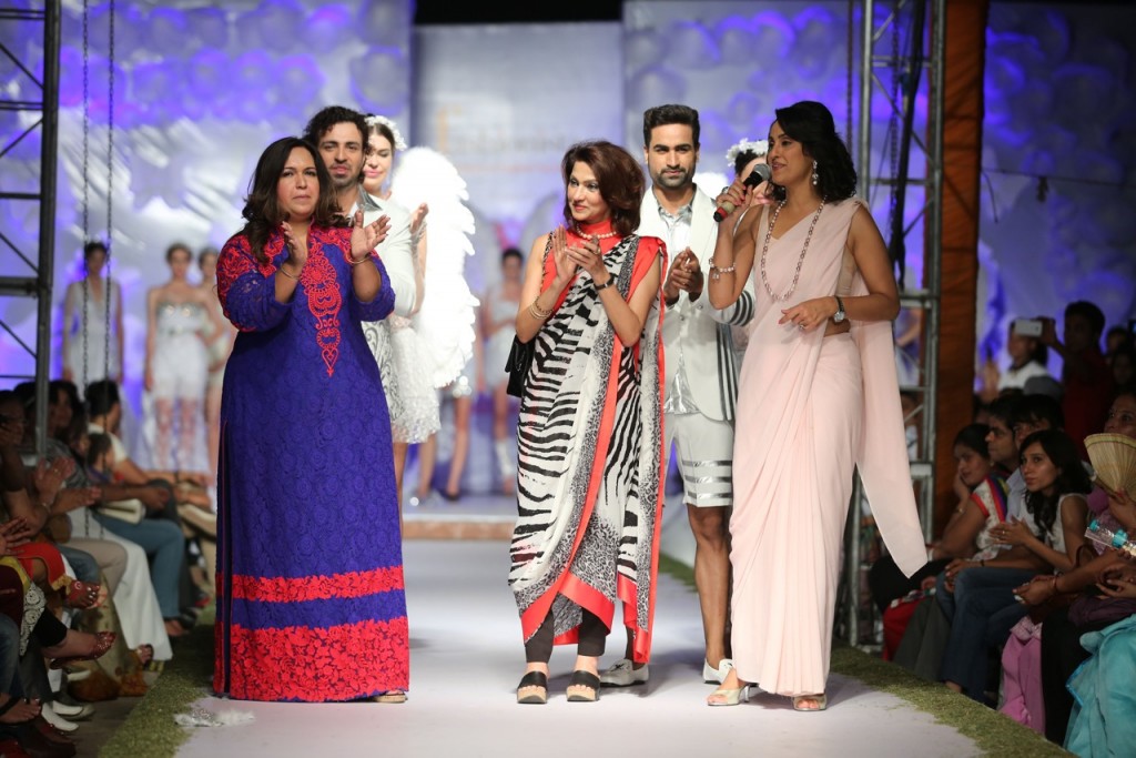(L-R) Neetu Pavan Manikatalia, Vandy Mehra, Shivani Wazir with models at the conclusion of the show